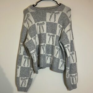 A new day size large sweater gray with bow detail